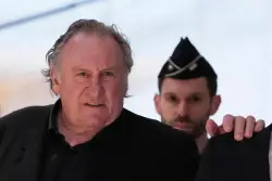 French actor Gérard Depardieu found guilty of sexual assault and given 18-month suspended sentence